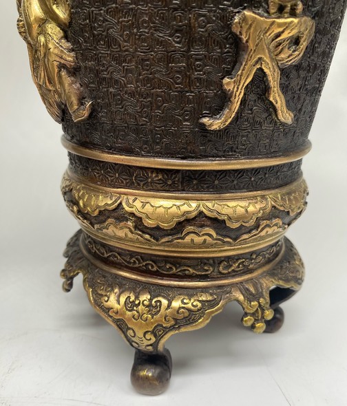 Paired oriental vases
with dragons and Bodhisattvas