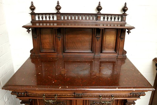 salon antiques things old furniture cabinet and bureau in henri II style in walnut with classic carving. Marble table top is griotte. Europe, 19th century