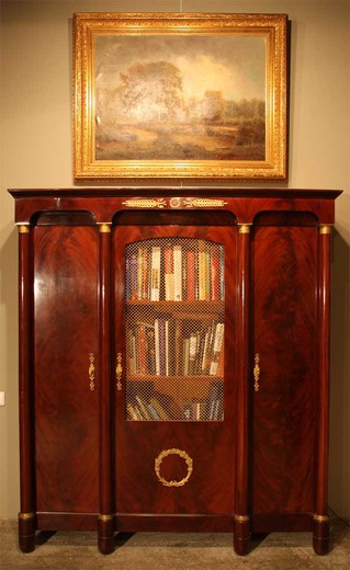 antique furniture cabinet in three pieces bookcase table armchair