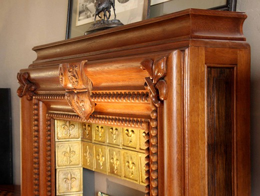 old oak wood and bronze fire mantel