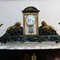 Antique clock set in bronze and marble