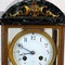 Antique clock set in bronze and marble