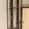 Wrought iron coat rack in the style of Art Deco