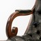 Leather armchair with ottoman