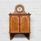 Antique wall cabinet and clock