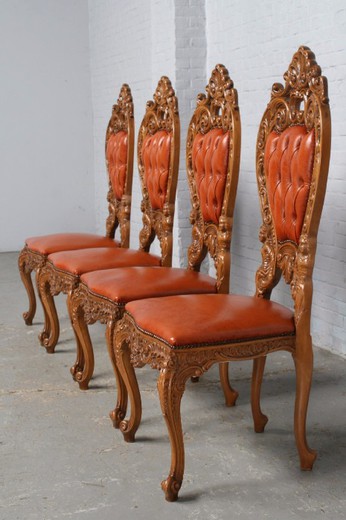 антикварные стулья из ореха и кожи