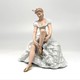 Vintage figurine "Ballerina Adjusting Her Pointe Shoes"