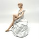Vintage figurine "Ballerina Adjusting Her Pointe Shoes"