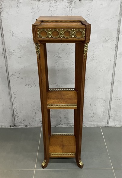 Vintage pedestal in Empire style