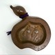 A vintage bronze gourd-shaped ashtray