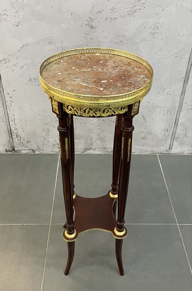 Antique pedestal in Empire style