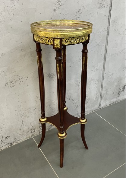 Antique pedestal in Empire style