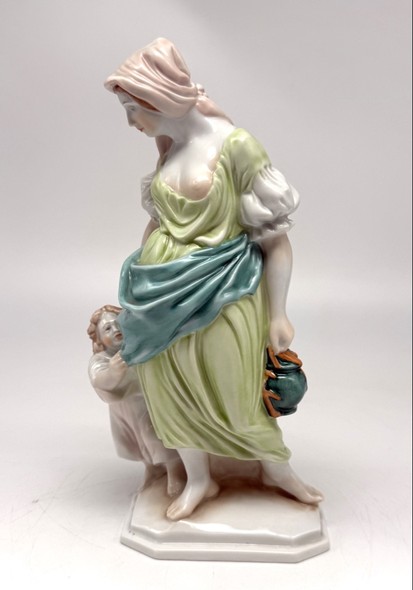 Antique figurine "Mother and Child."