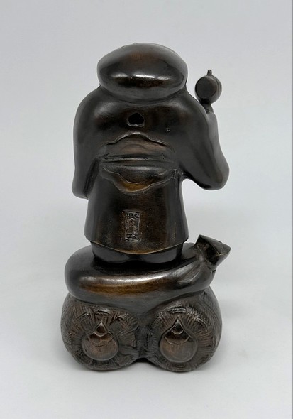 Antique sculpture "Daikoku with a mallet"