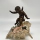 Antique sculpture "Cupid on a Shell"