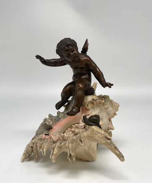 Antique sculpture "Cupid on a Shell"