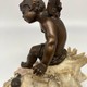 Antique sculpture "Cupid on a Shell"