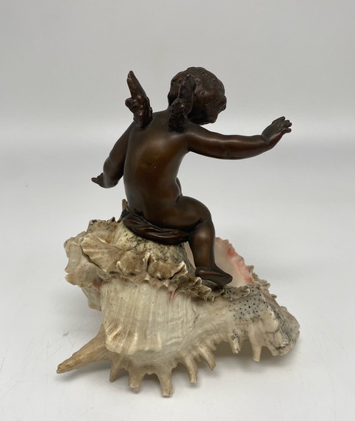 Antique sculpture "Cupid on a Shell"