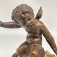 Antique sculpture "Cupid on a Shell"