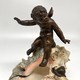 Antique sculpture "Cupid on a Shell"