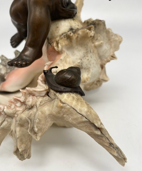 Antique sculpture "Cupid on a Shell"