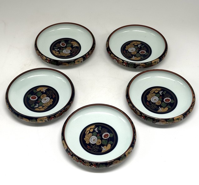 Vintage set of five plates