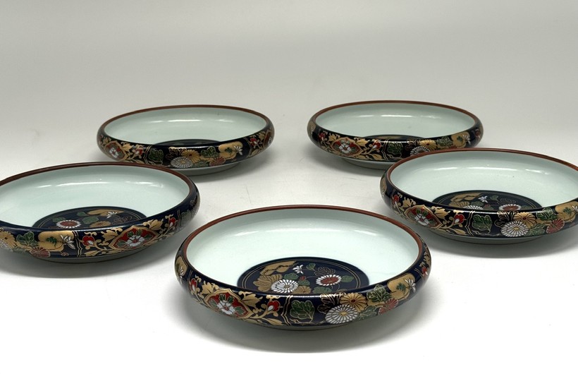 Vintage set of five plates