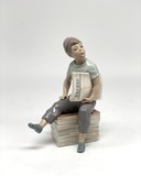 Sculpture "The Newsboy"