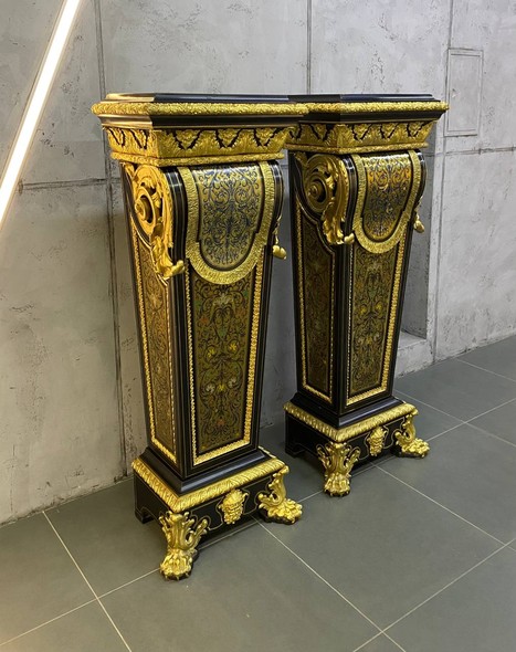 Antique paired pedestals