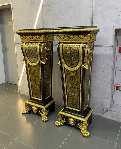 Antique paired pedestals