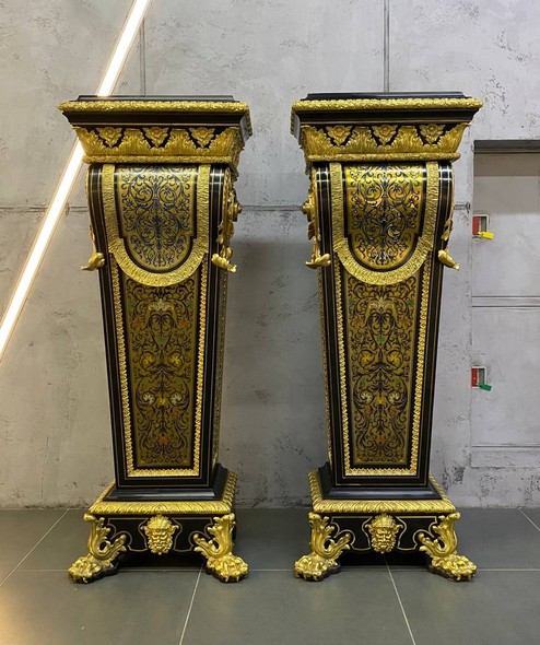 Antique paired pedestals