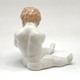 Antique sculpture of a little boy