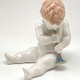 Antique sculpture of a little boy